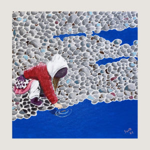 Petite fille sur les rochers
